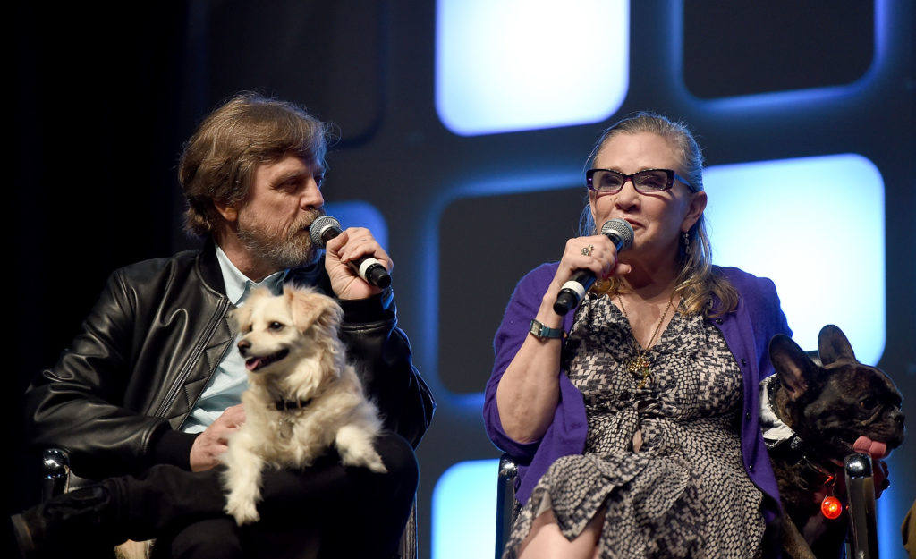 LONDON, ENGLAND - JULY 17:  Mark Hamill, Carrie Fisher and her dog Gary on stage during Future Directors Panel at the Star Wars Celebration 2016 at ExCel on July 17, 2016 in London, England.  (Photo by Ben A. Pruchnie/Getty Images for Walt Disney Studios) *** Local Caption *** Mark Hamill; Carrie Fisher; Gary Fisher